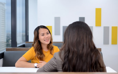 two woman having a conversation