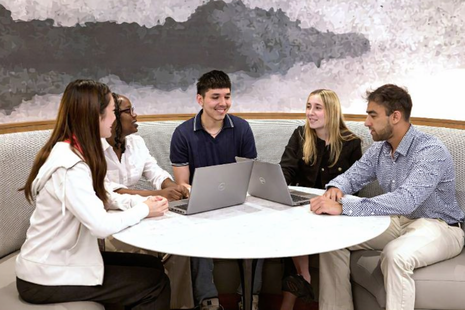Group of colleagues collaborating around a table