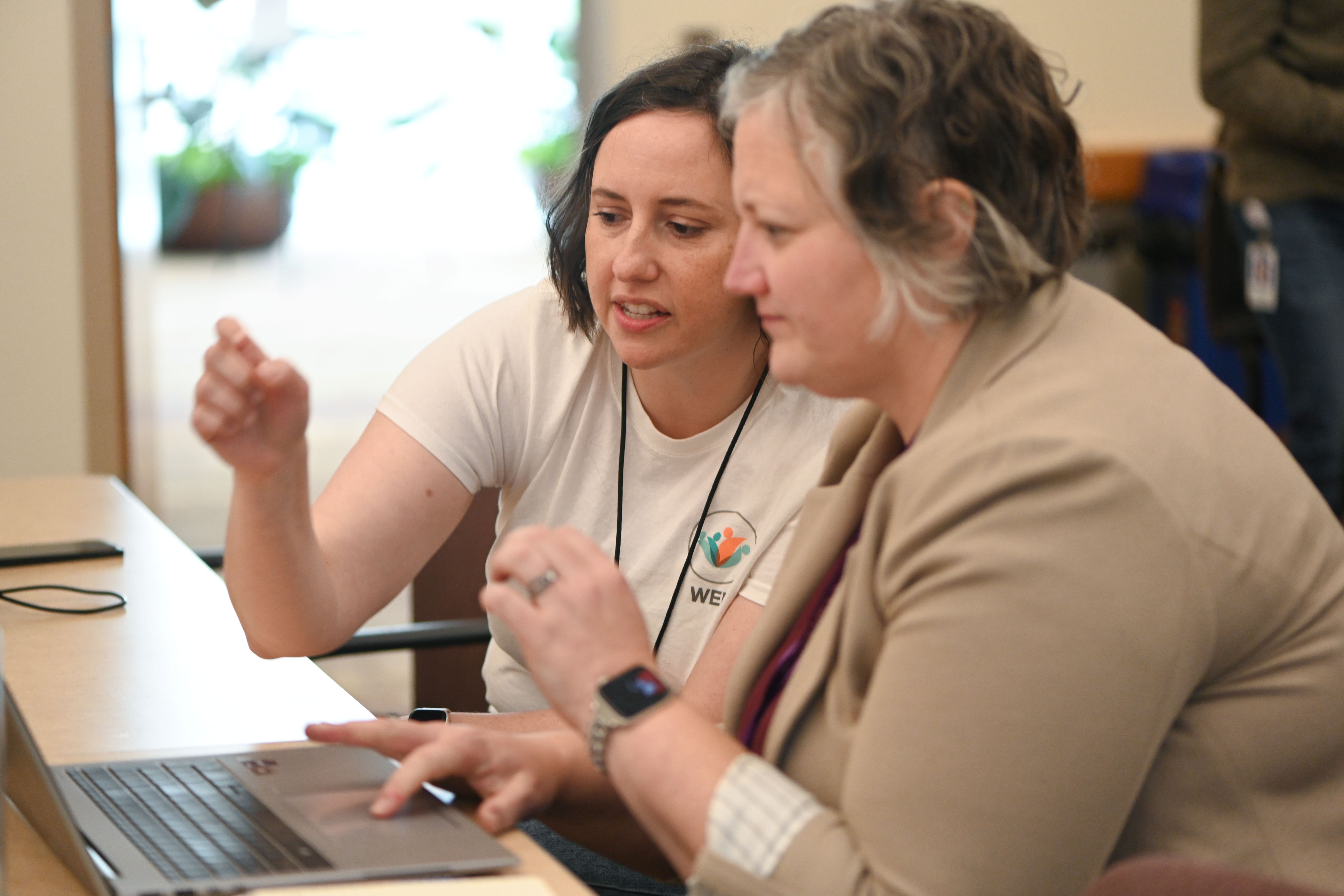 women looking at laptop