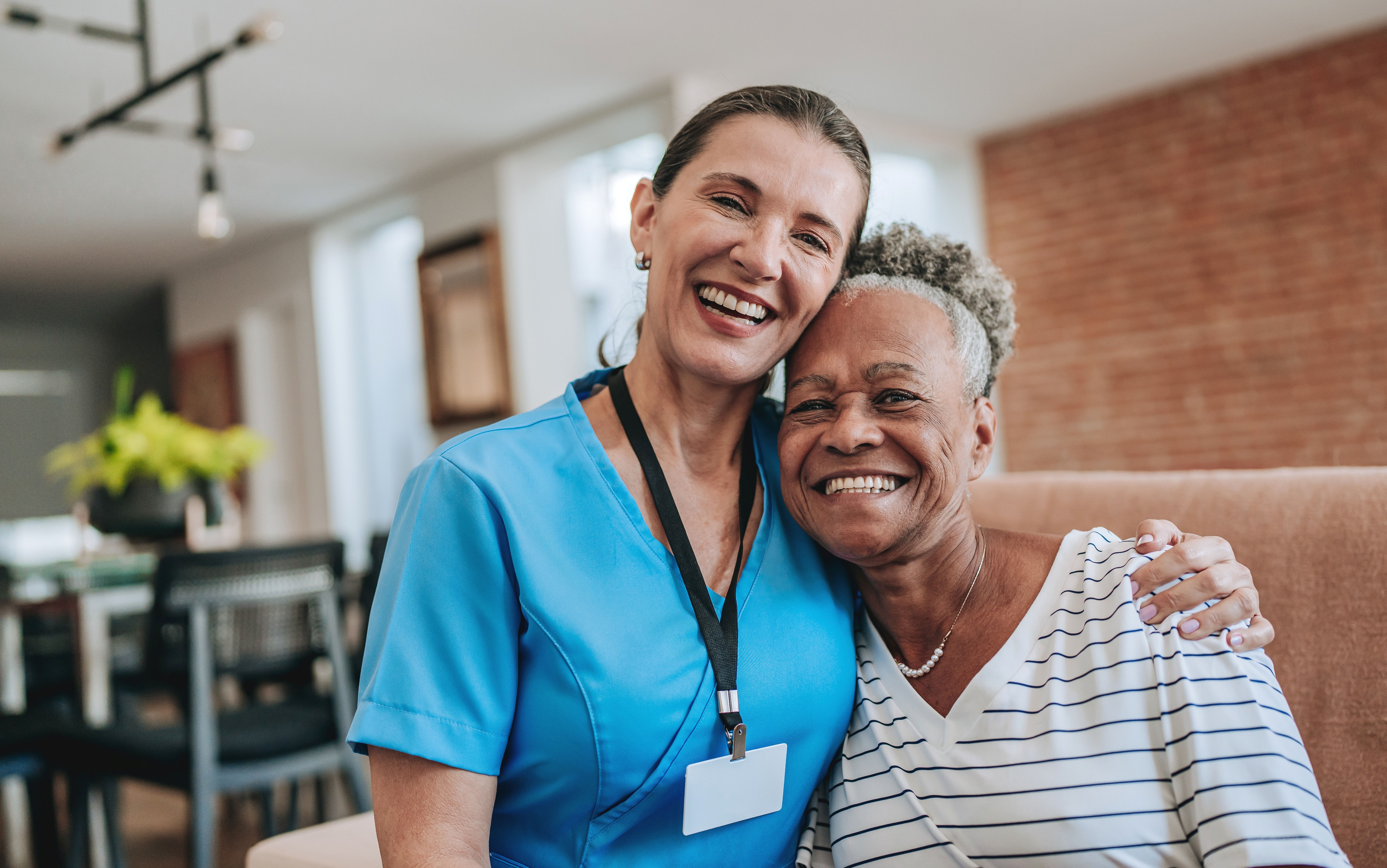 women hugging clinician