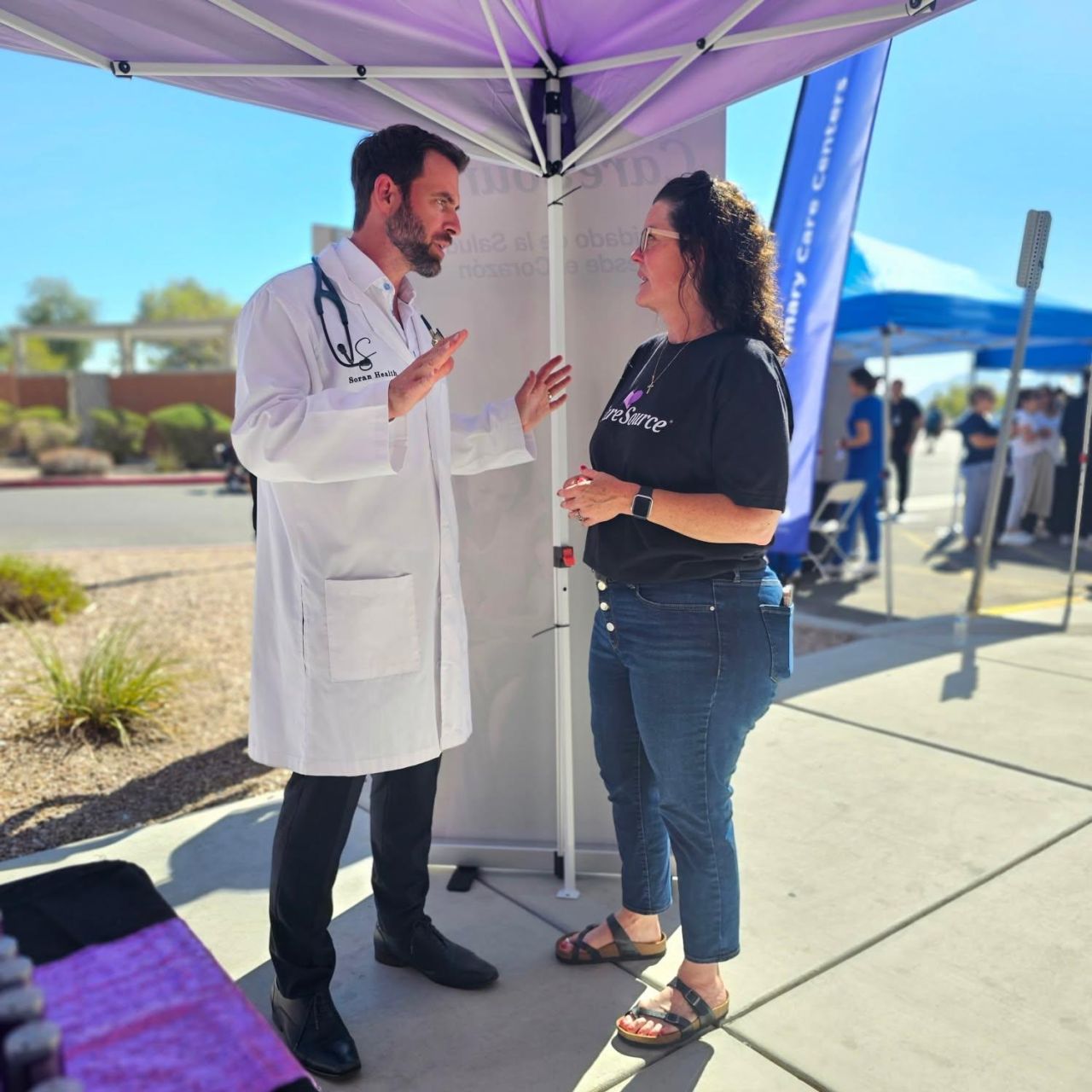 clinician talking to woman