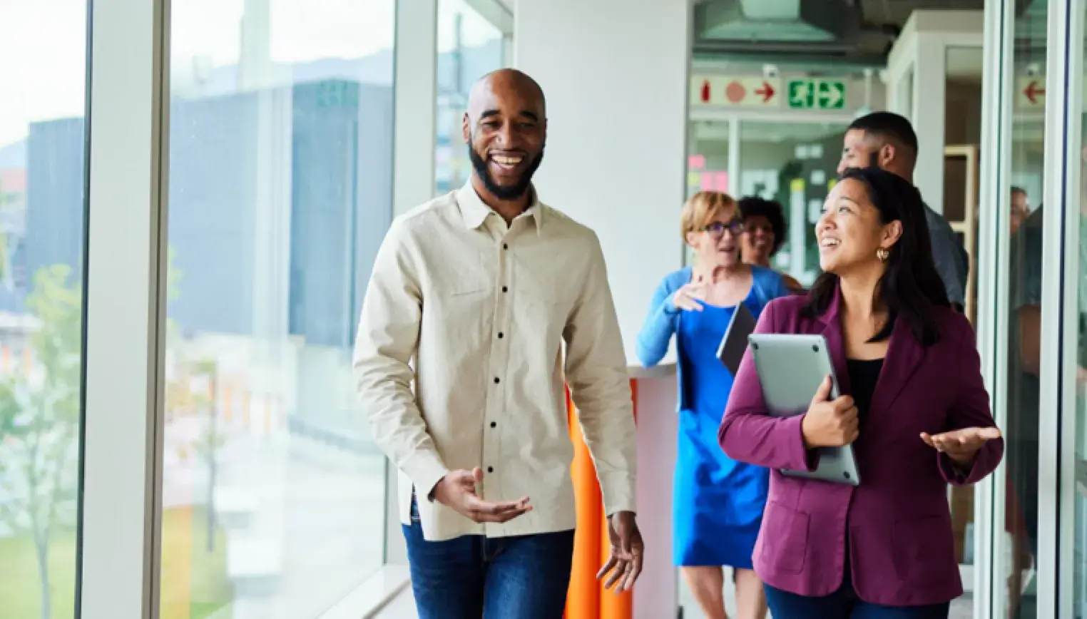 employees walking in a hallway