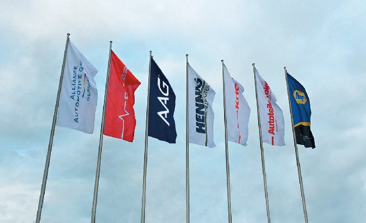 A group of flags displaying brand logos