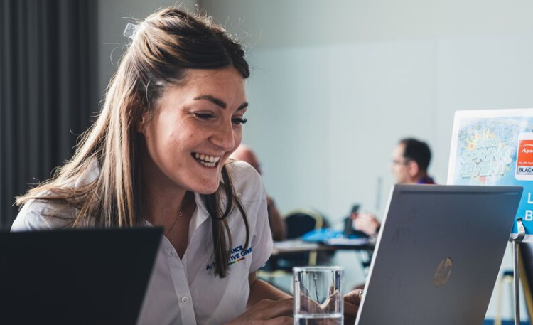 Sales employee working on a computer