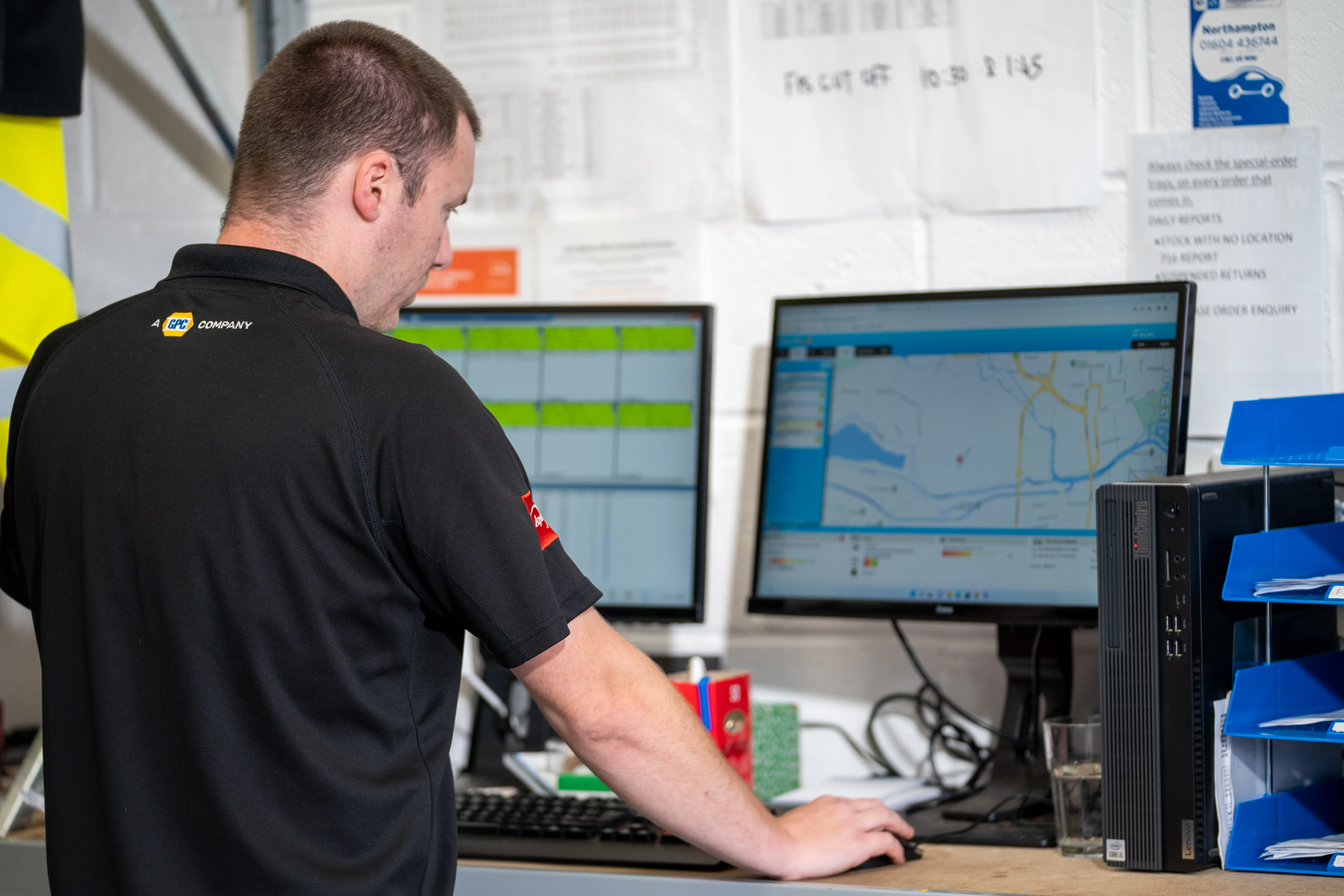 Warehouse employee working on a computer