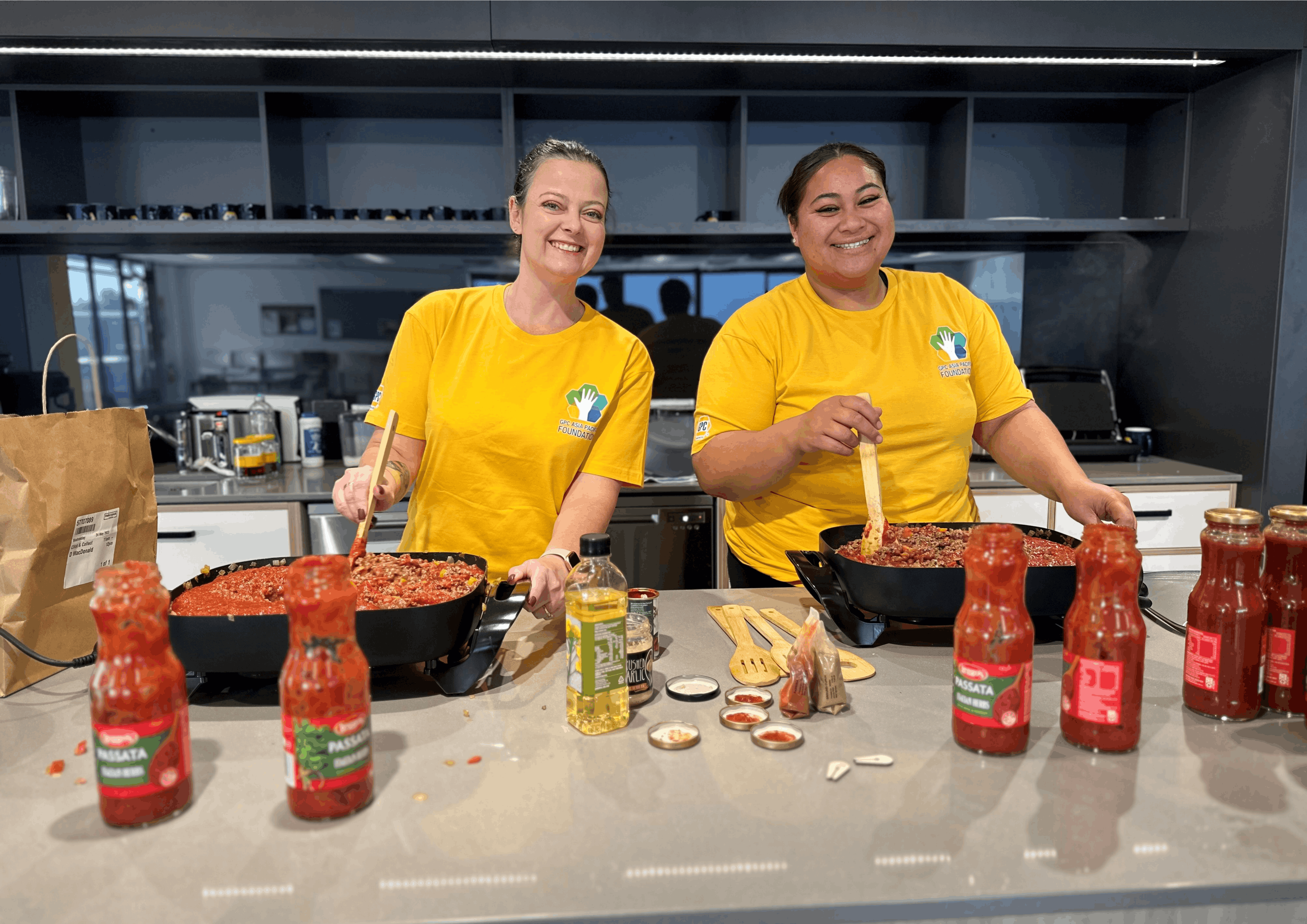 Man getting head shaved during communities event.