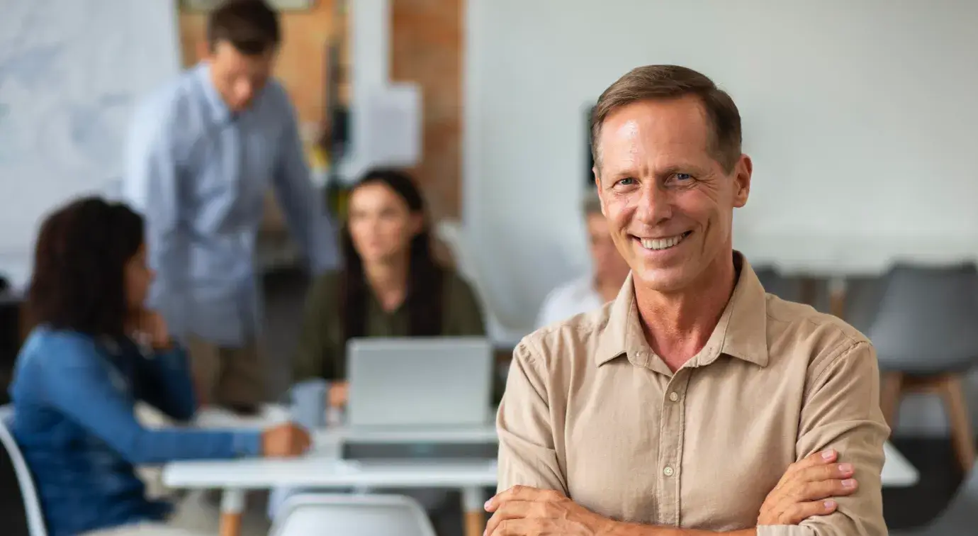 man smiling at conference