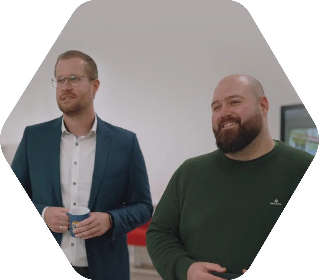 Two men talking about Management