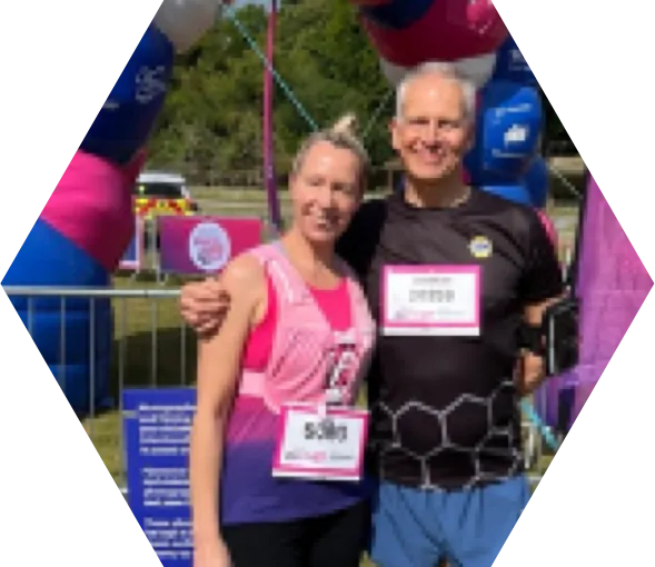 Two employees standing near