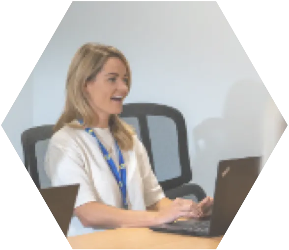 Women Talking while looking her laptop