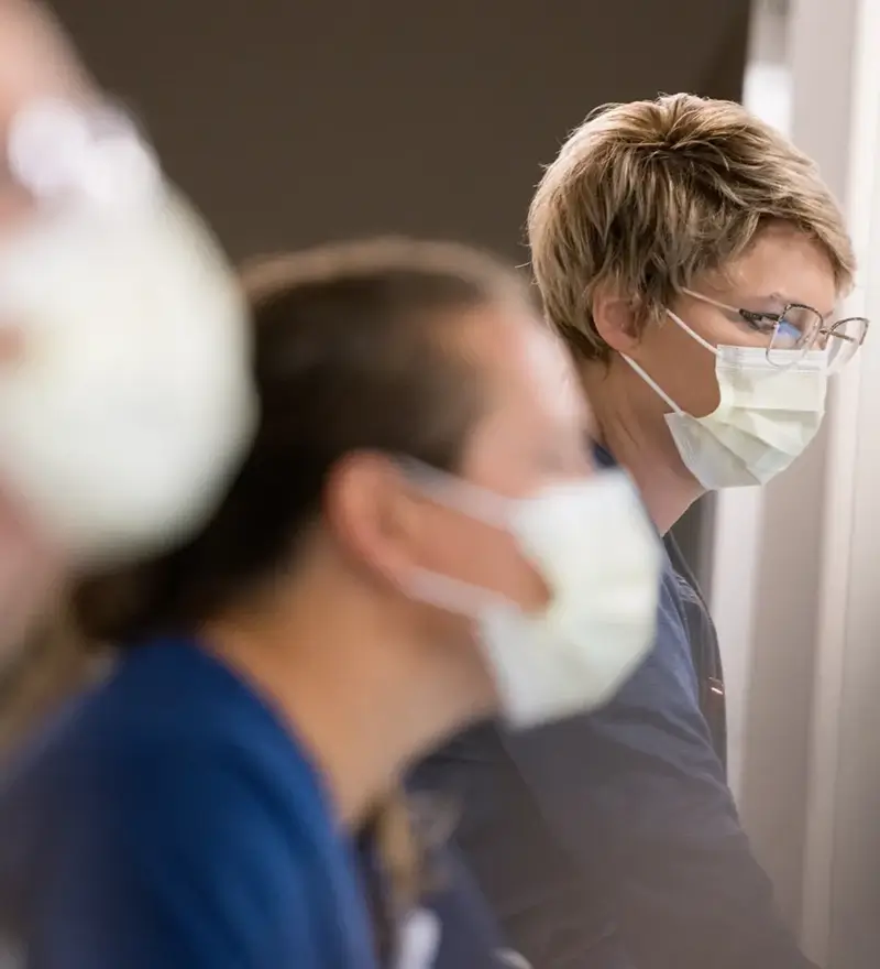 Clinicians wearing face masks