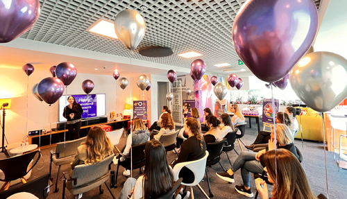 Group picture of people having fun at the office