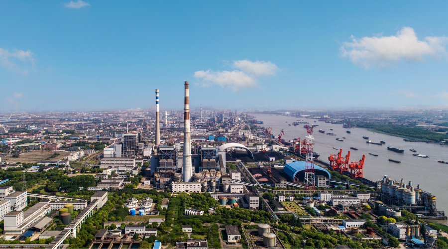 Aerial view of Jinshan district in Shanghai - industrial buildings with waterway in background