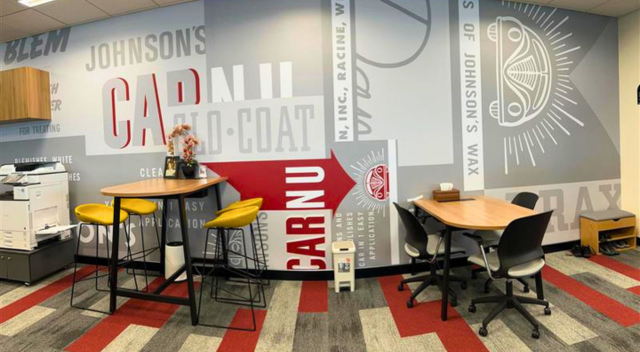 Dining area with colorful SCJ legacy-inspired murals on wall