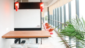 Seating area near windows and view at Kuala Lumpur office