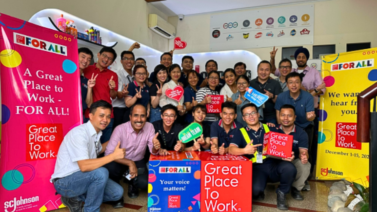 Group photo of SCJ Vietnam team with Great Place to Work banners