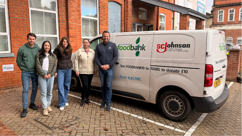LSB team members in front of food bank van with SCJ logo