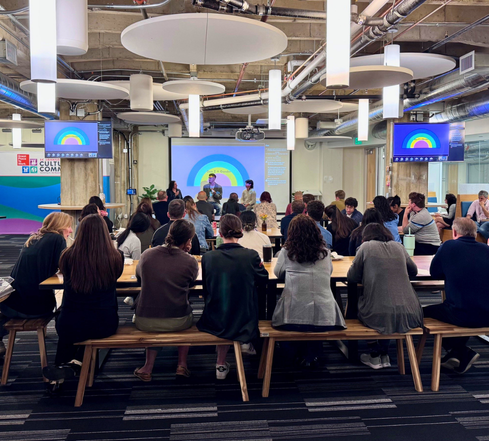 LSB team members listening to a Pride month panel speaker