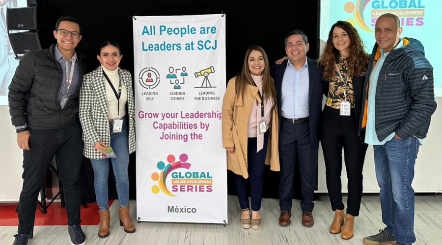 Group of SCJ team members posing for a photo after a Global Leadership Development session