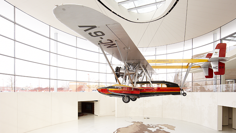 SC Johnson plane hanging over atrium of Forteleza Hall at corporate headquarters building