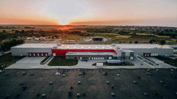 Aerial photo of the Gorzów office building with the sun in the background
