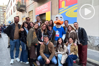 Group of SCJ Italy team members posing for group photo outside of SCJ Escape House activation