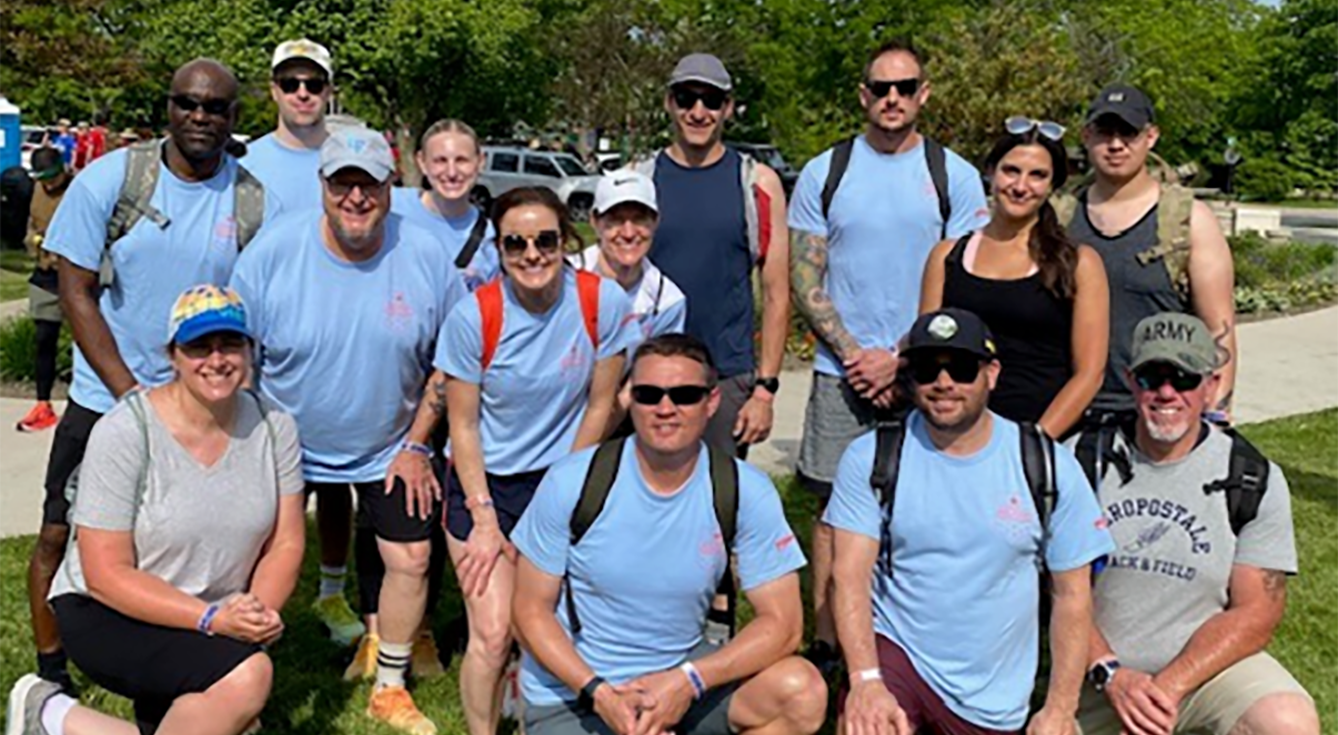 CMV ERG team members posing for a group photo after Ruck March event