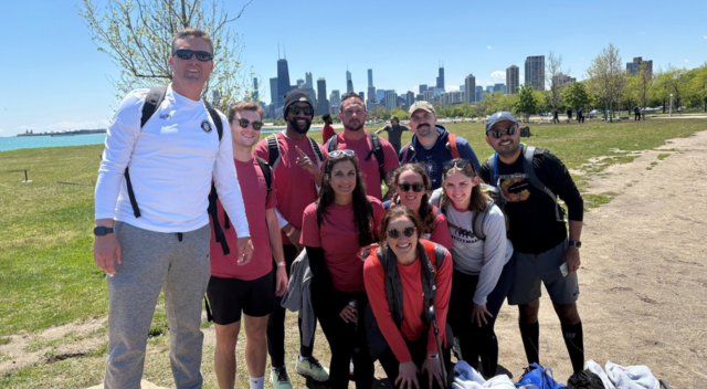 CMV ERG team members posing for a group photo after Ruck March event