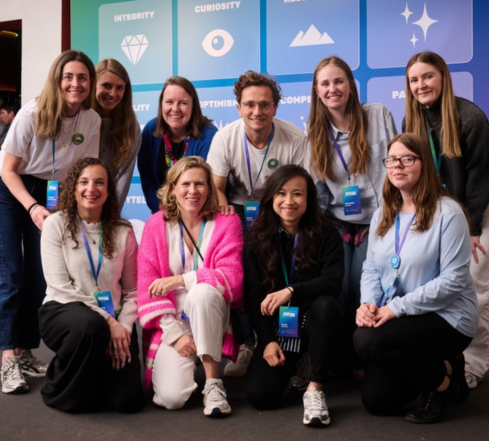 group of LSB employees posing for photo at all hands meeting