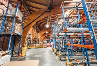 Malle, Belgium factory warehouse area with beautiful wooden beams on ceiling