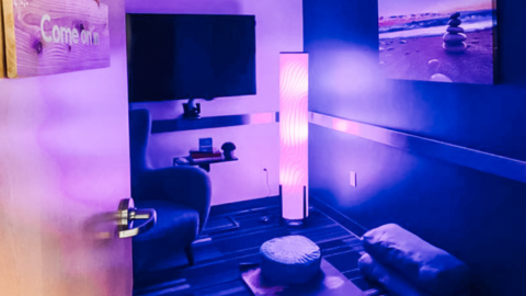 Relaxation room with soft lighting and seating areas