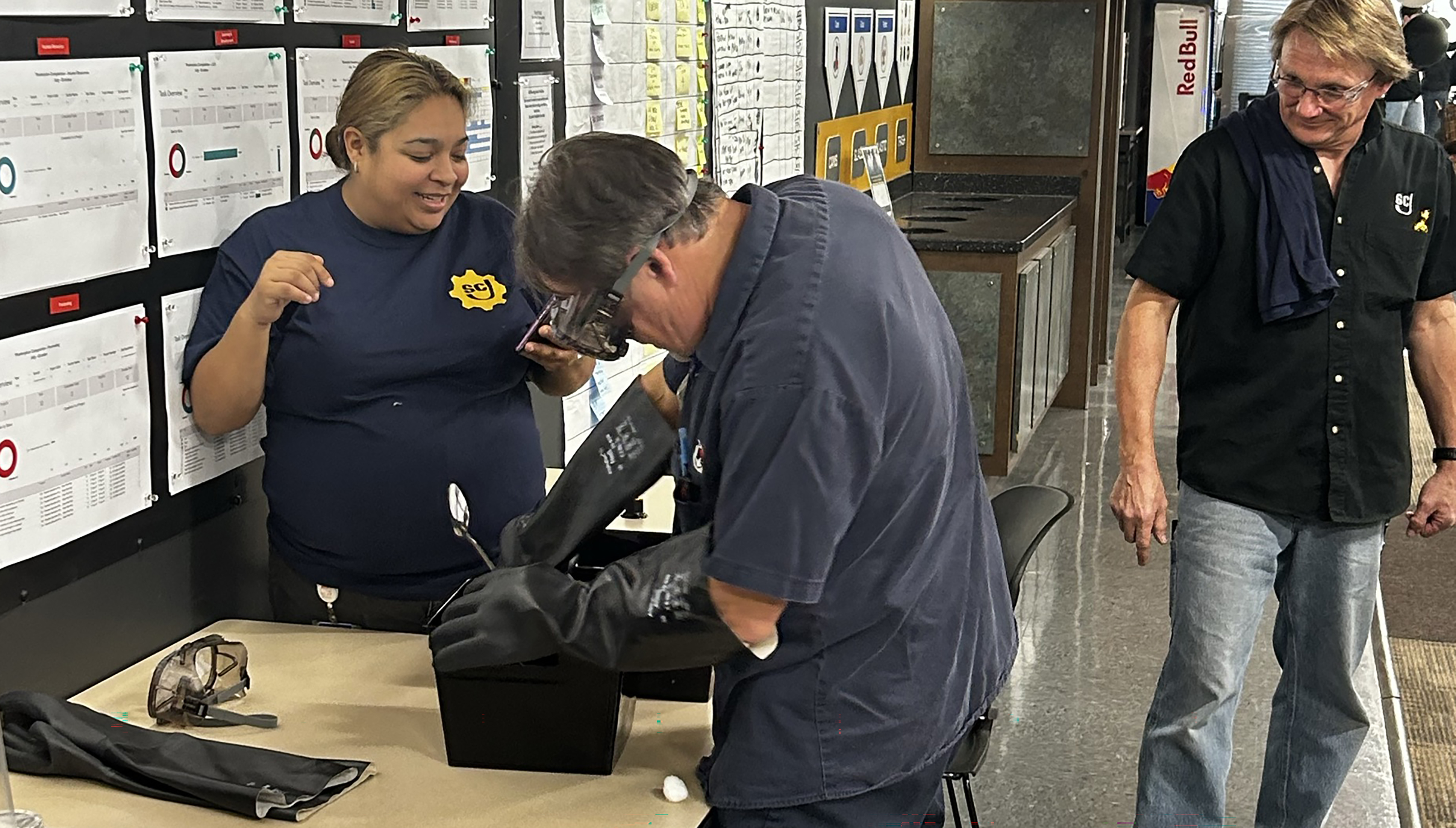 Team member wearing personal protective equipment during learning event