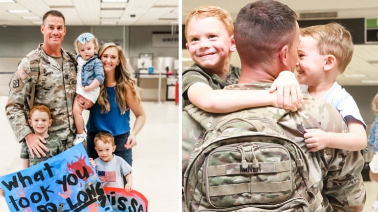 Veteran embracing his children and smiling with them