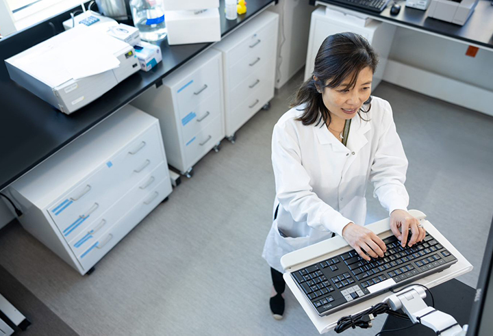 Woman working at a computer