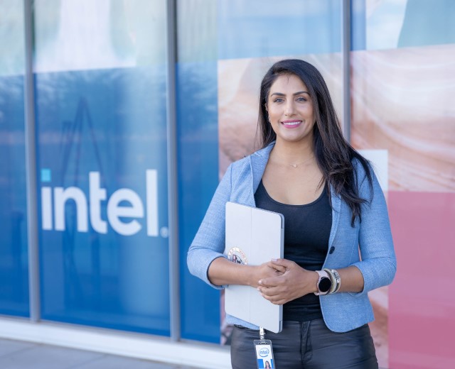 Intel Colorado employee holding laptop