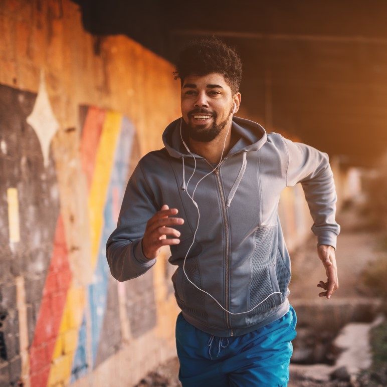 Athletic running with earphones