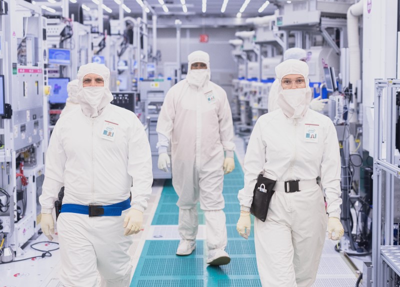 Manufacturing Technicians wearing bunny suits