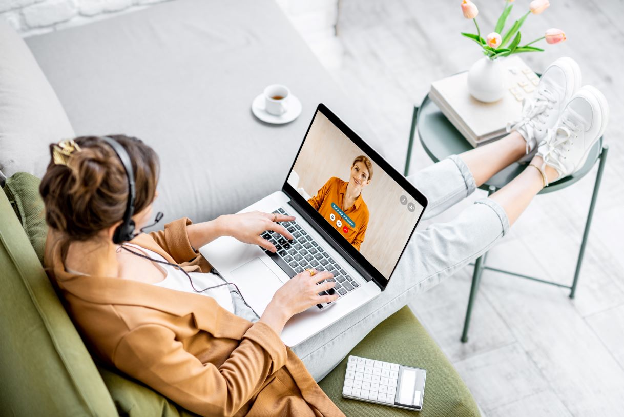 Woman sitting at laptop