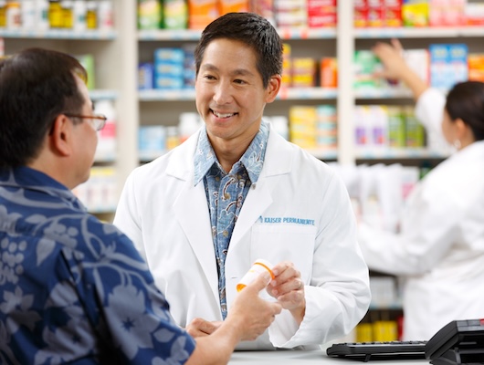 Pharmacist with customer