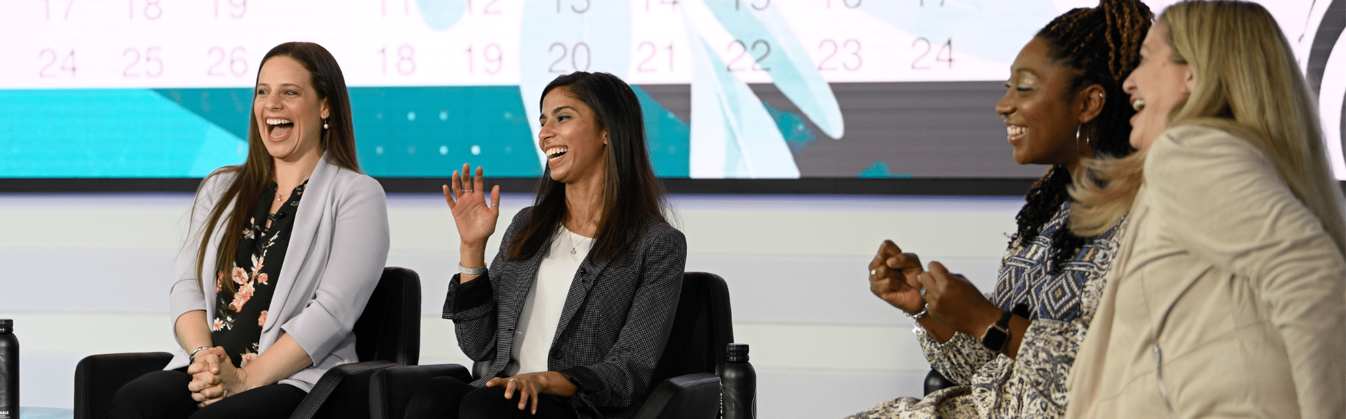 Lockheed Martin Women Employees Laughing During Conversation