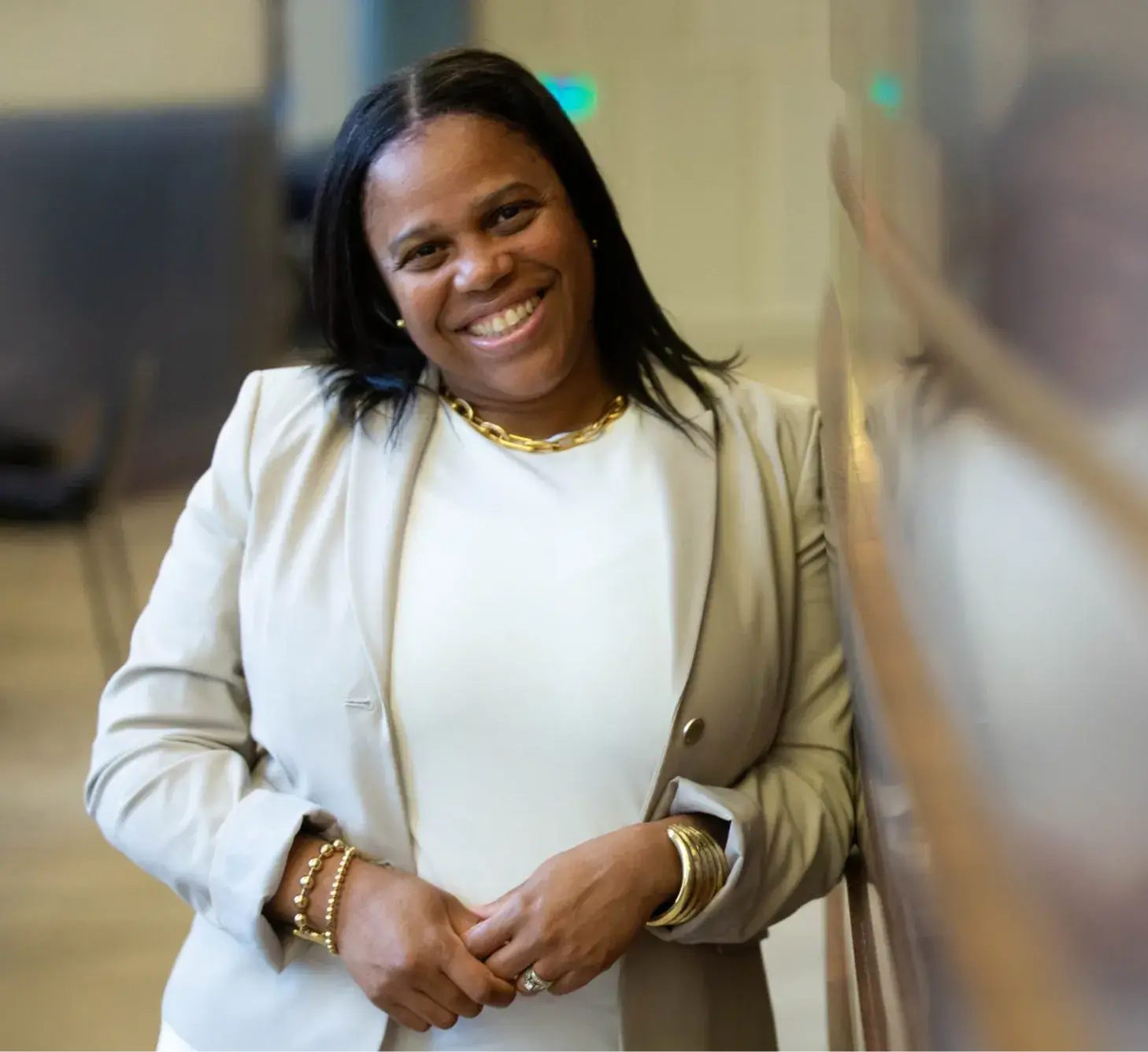 Woman smiling in a blazer