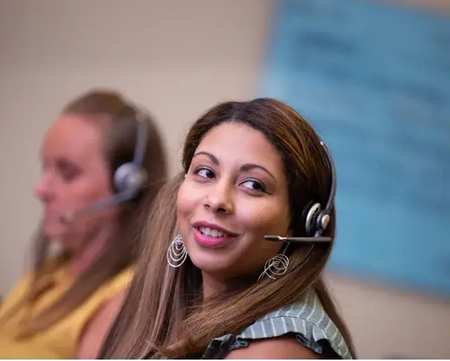 MassMutual employee using a headset