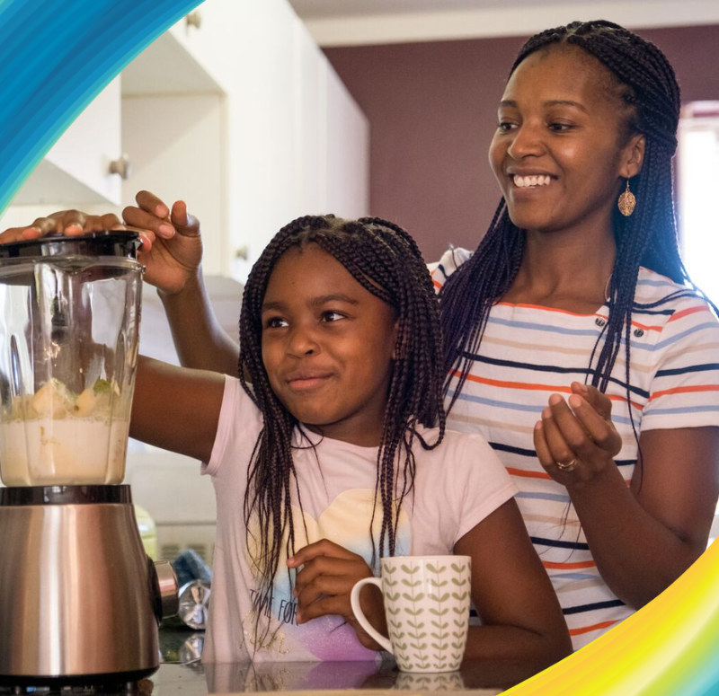 Mother and daughter together in the kitchen