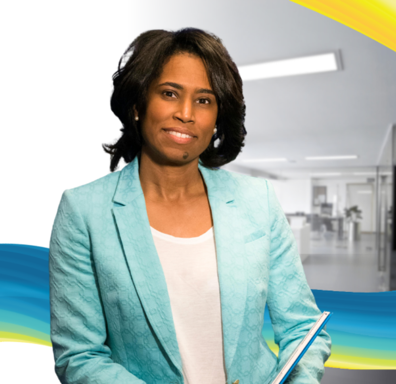 professional woman smiling in an office