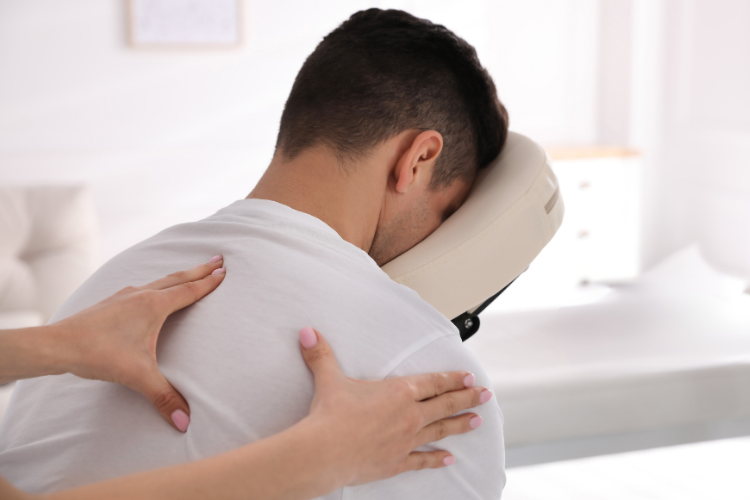man getting a massage in a chair