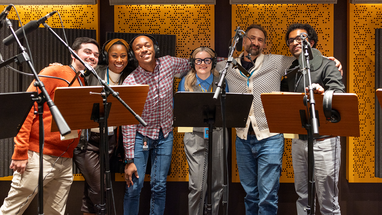 Diverse group of narrators in a studio.