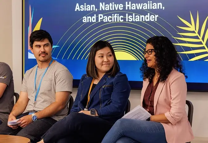 Group of people sitting on a panel