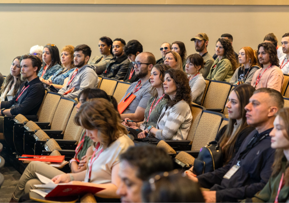 Employees attending a new hire orientation session