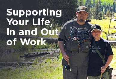 Sean and his son on a fishing trip