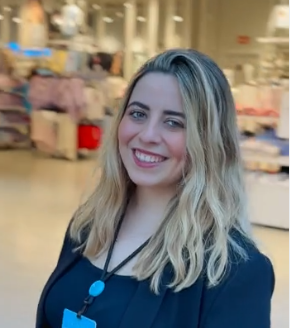 Colleague smiling in a store